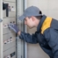 An electrical guy inspecting safety switch